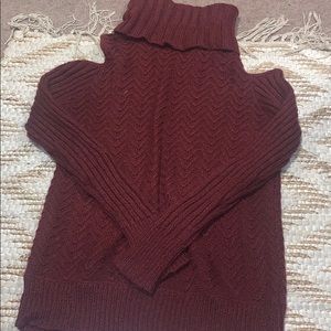 2 knitted sweaters, cut out shoulders lightly worn